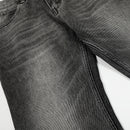 Washed and ground white distressed jeans