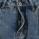 Spray painted and dirty wide leg jeans