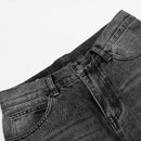 Washed and ground white distressed jeans