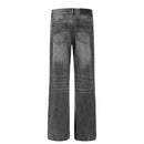 Washed and ground white distressed jeans