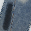 Spray painted and dirty wide leg jeans
